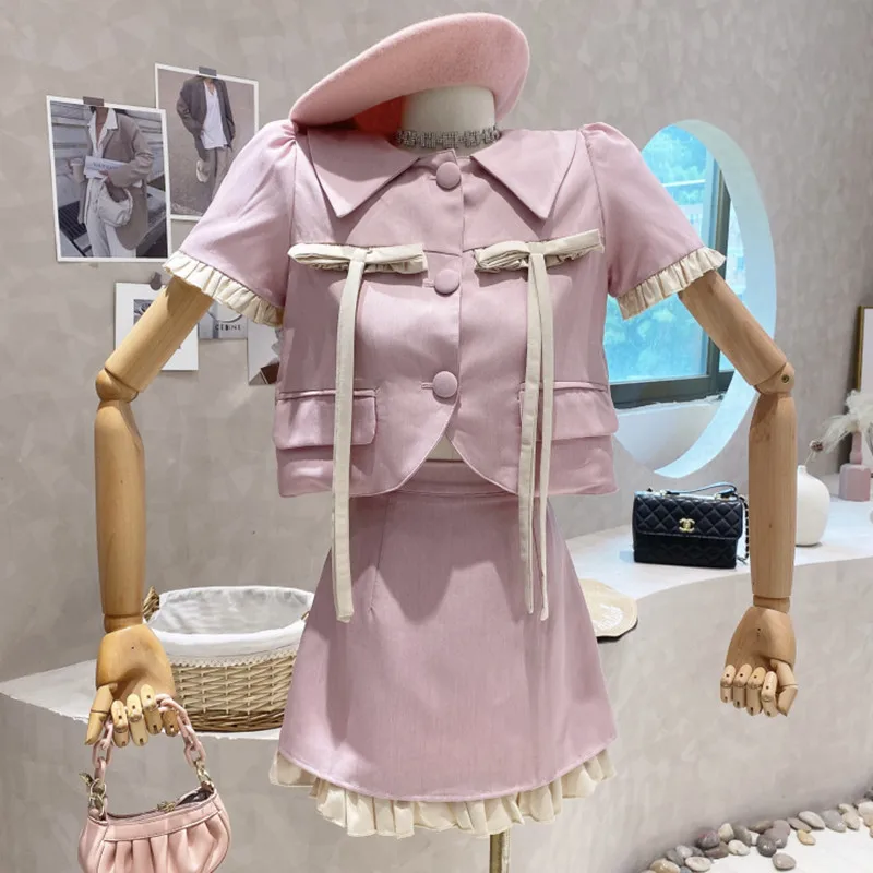 

Niche Design New Women's Clothing 2022 Summer Design Lace Bow Puff Sleeve Short Top Sweet High Waist Skirt Two Piece Set