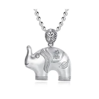 double sided vintage elephant pendant