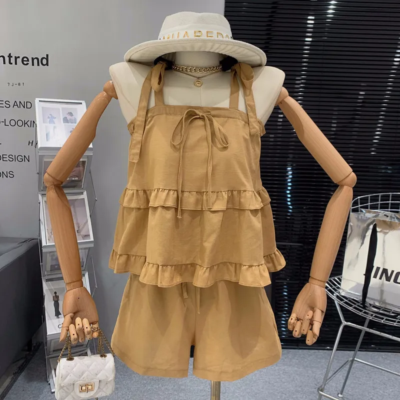 

Дизайнерский Женский комплект из двух предметов, топ на бретельках с рюшами и шорты