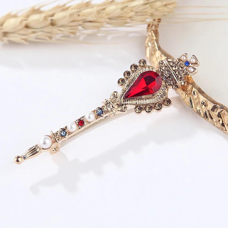 

Baroque Vintage Large Red Gemstone Brooches For Women Fashion Gold Noble Crown Crystal Magic Wand Safety Coat Dress Pins