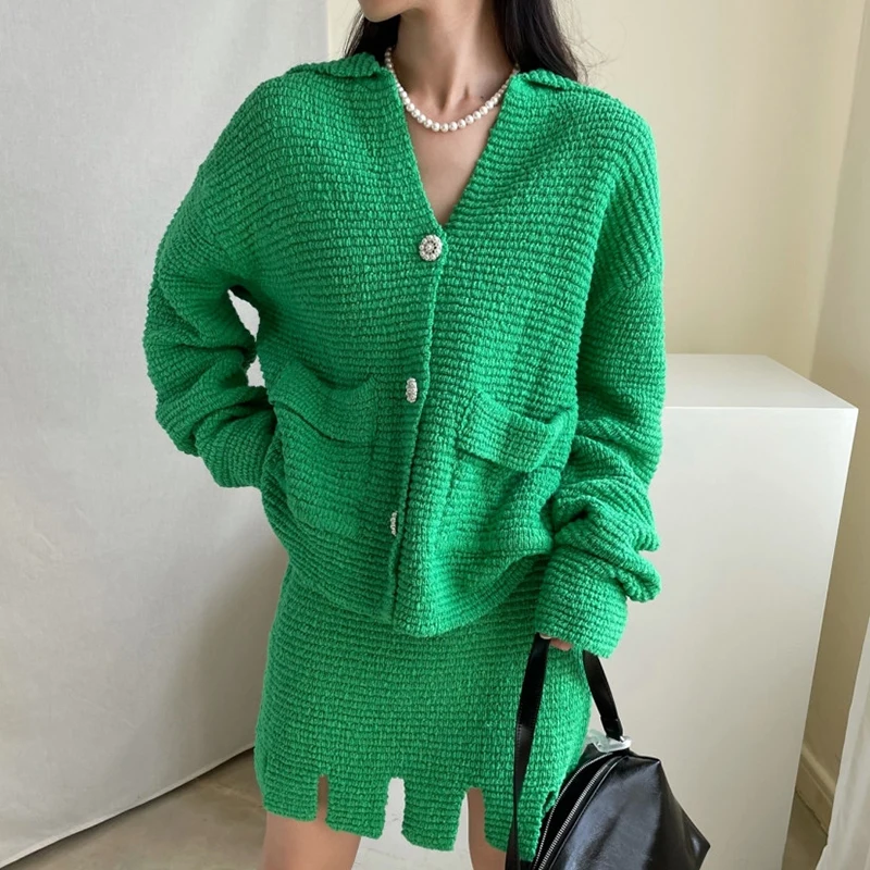

New Korean Version of The Autumn Style V-neck Single Row Long-sleeved Sweater Temperament High Waist Short Skirt Knit Suit Women