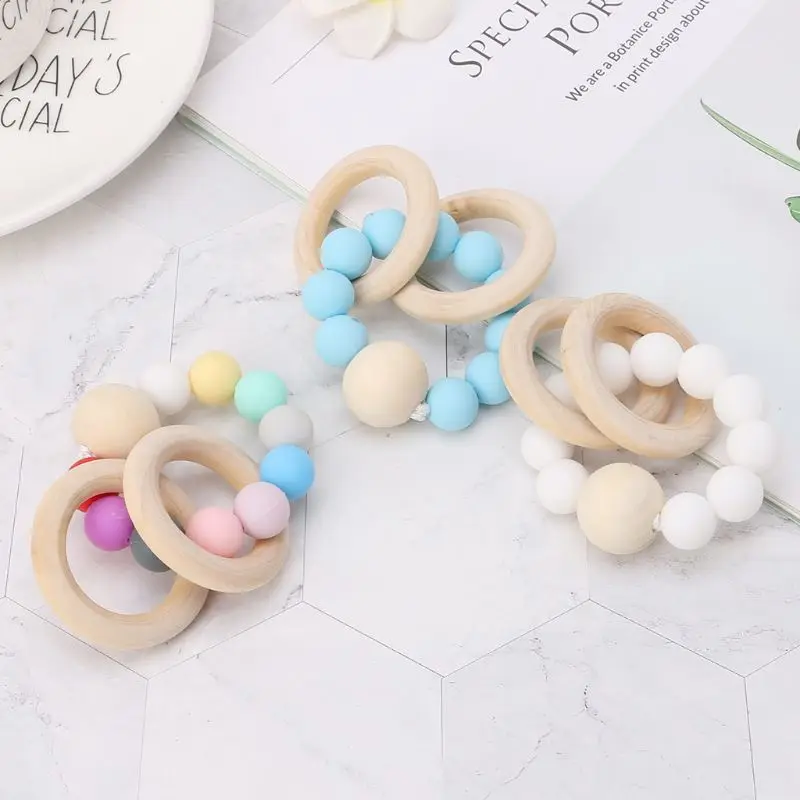 

Baby Teether Bracelet Teething Toys Chew Bite Newborn Teeth Care Beads Jewelry Pain Relief Silicone Wood Rings Infant Supplies