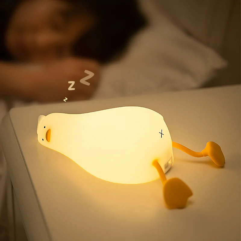 

Lovely LED Lying Flat Duck Silicone Night Light USB Charging Bedside with Sleep Night Light Pat Dimming Atmosphere Table Lamp