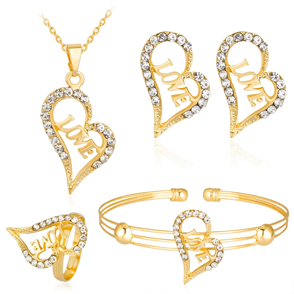 

Ethnic Love Heart Hollow Rhinestones Jewelry Set Gold Statement Necklace Earrings Bracelet Ring Jewelry Wholesale Summer Jewelry