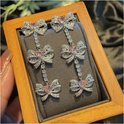 

2023 Women S925 silver needle light luxury earrings bow tassels long love zircon earrings