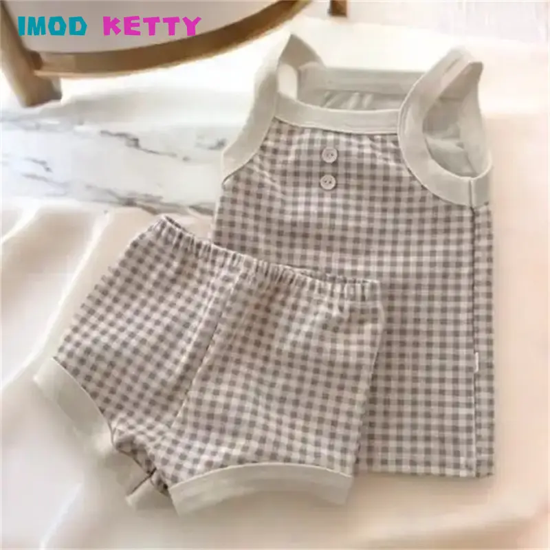 

Новинка лета 2023, корейское издание, Детский комплект унисекс, простая футболка без рукавов, Сексуальная футболка на бретельках для девочек, однотонные хлопковые шорты, спортивный костюм