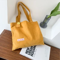 women shoulder bag 2022 corduroy tote bag girl shopper fashion large capacity embroidered letter buttoned shoulder strap handbag