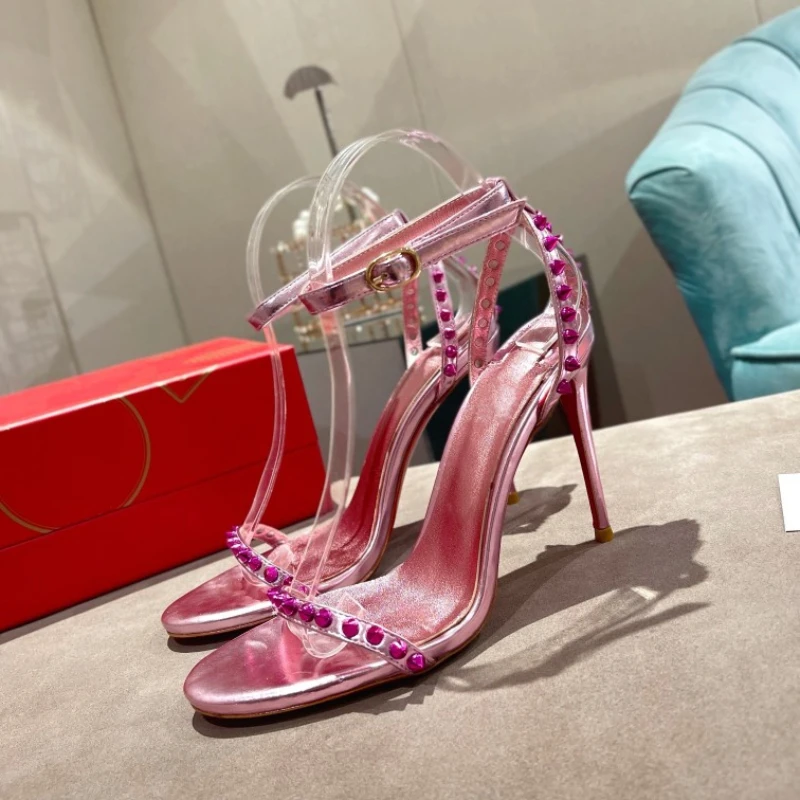 

Summer New Color-blocking Rivets Word Buckle Hollow Stiletto Sandals Europe and The United States Roman High-heeled Sandals