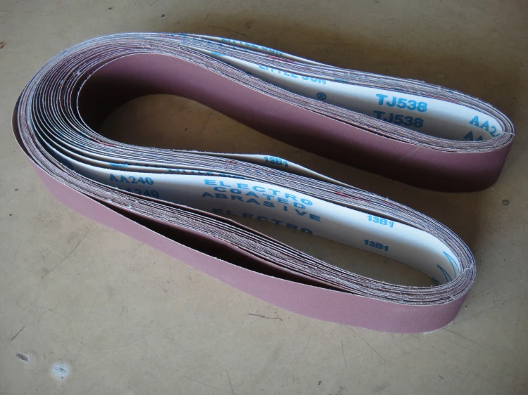 900 шт., 1080x25 мм, абразивный ремень для шлифовальных принадлежностей, мягкая ткань TJ538 900 шт., 1080x25 мм, абразивный ремень для шлифовальных принадлежностей, мягкая ткань TJ538