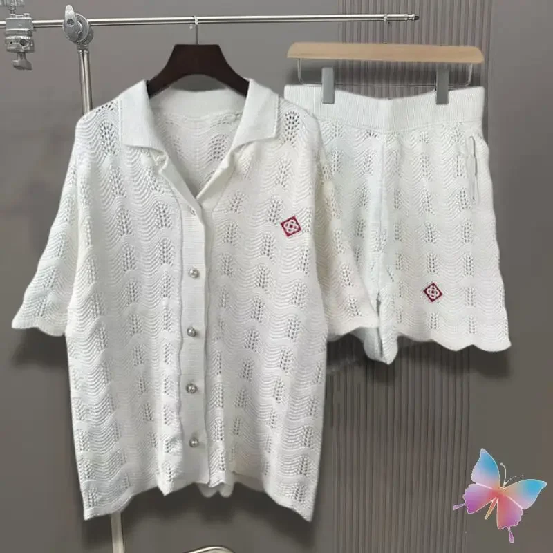 Рубашка трикотажная с перламутровыми вставками V-образным вырезом и коротким