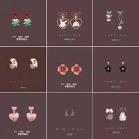 2022 new korean version of cute girl cartoon bear and rabbit asymmetric bow stud earrings s925 silver needle flower earrings