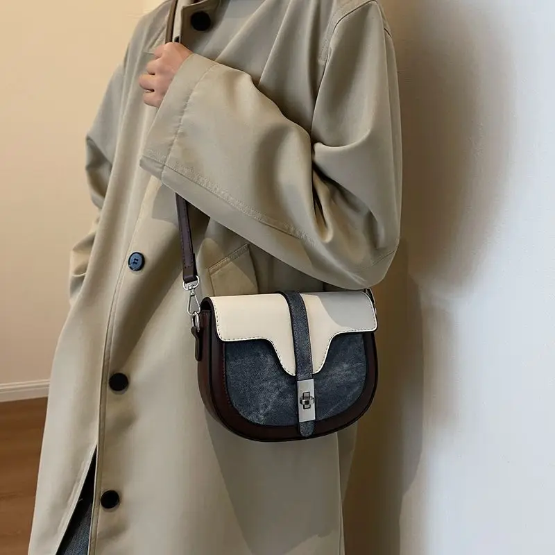 

Senior sense of niche design semi-circular saddle bag solid color retro small bag 2023 new one-shoulder messenger bag female