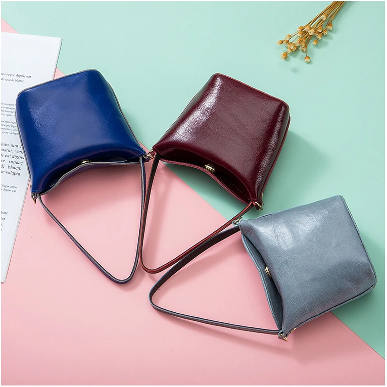 

New Mini Women Wallets Large Capacity Money Bag Genuine Leather Coin Purse Female Small Bucket For Women Coin Purse Earphone Bag