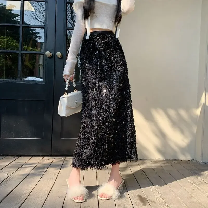 Женская длинная юбка с кисточками и пайетками