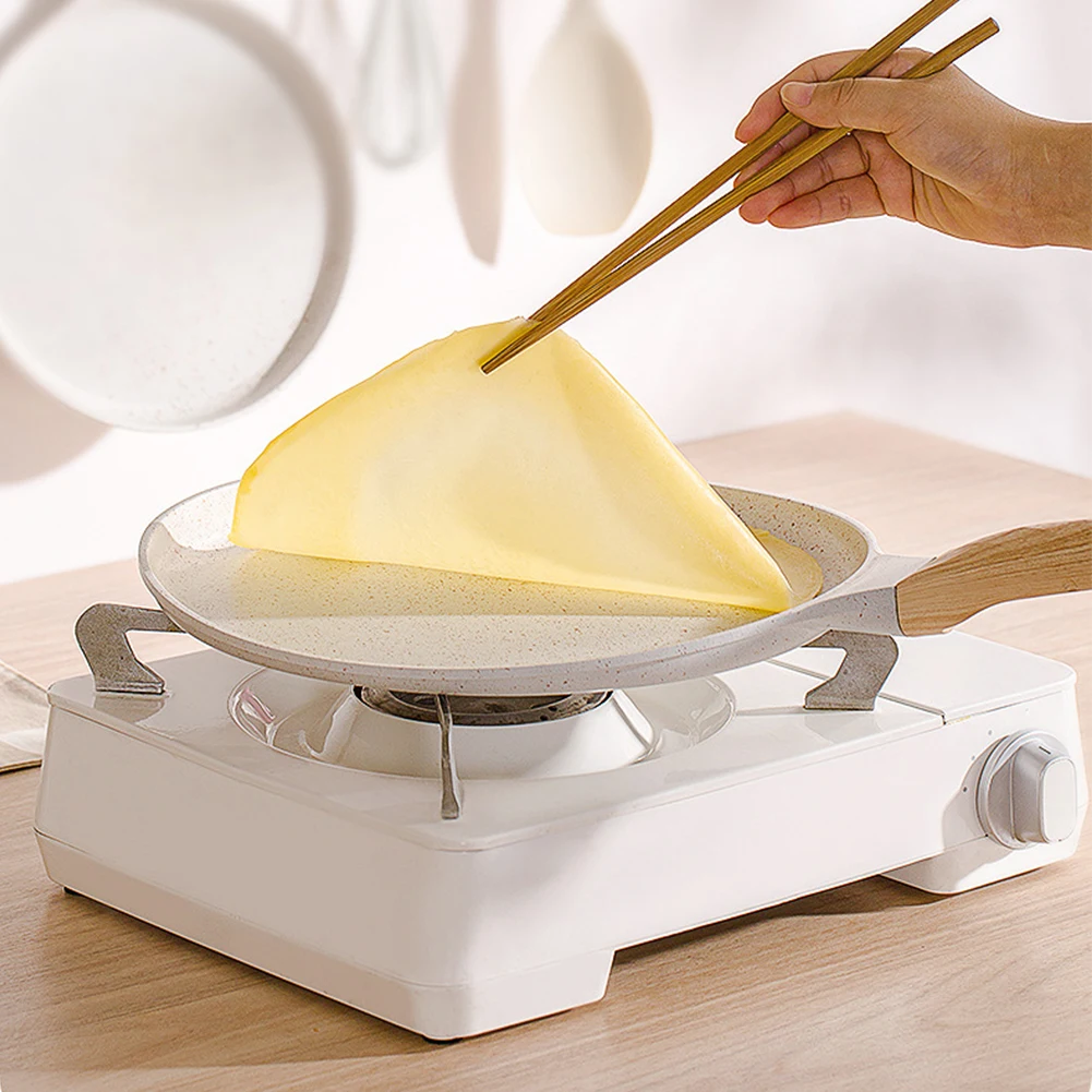 Совместимая с варочной панелью. Кастрюля из литого алюминия. Легкий дизайн.