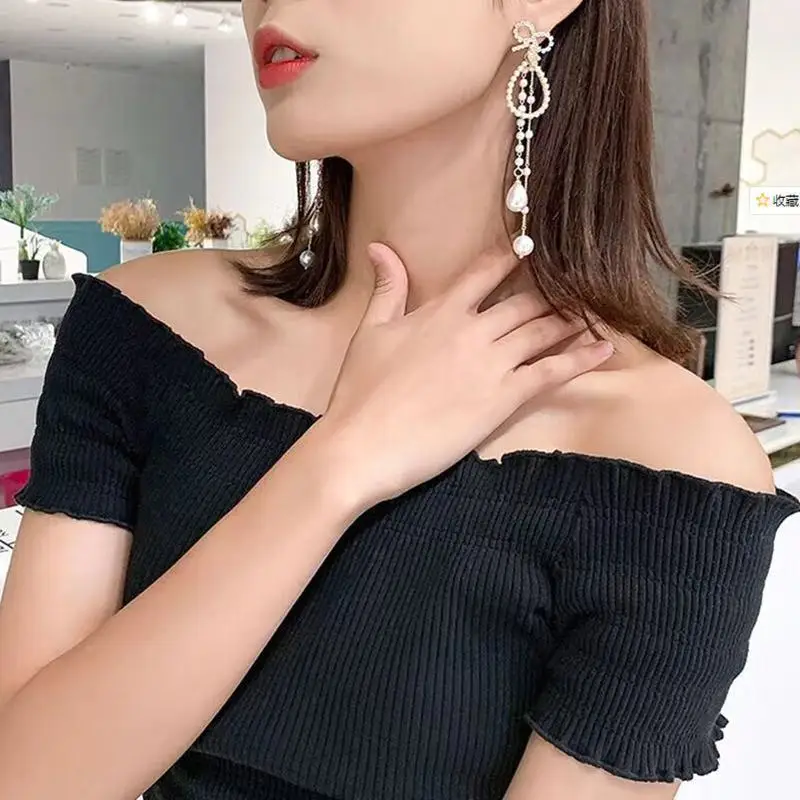 

Long pearl earrings female European and American retro tassel Rhinestone Bow Earrings