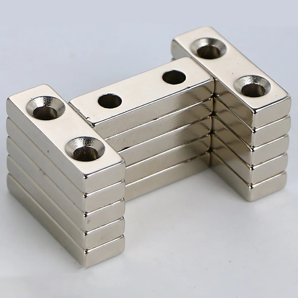 Неодимовые магниты с двумя отверстиями 30x10x3 мм квадратные никелированным