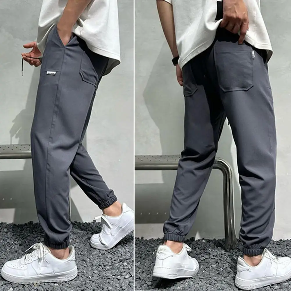 

Stylish Joggers Trousers Mid-rise Colorfast Men Wide Leg Running Loose Sweatpants Shrinkable Cuffs Men Pants Daily Clothing