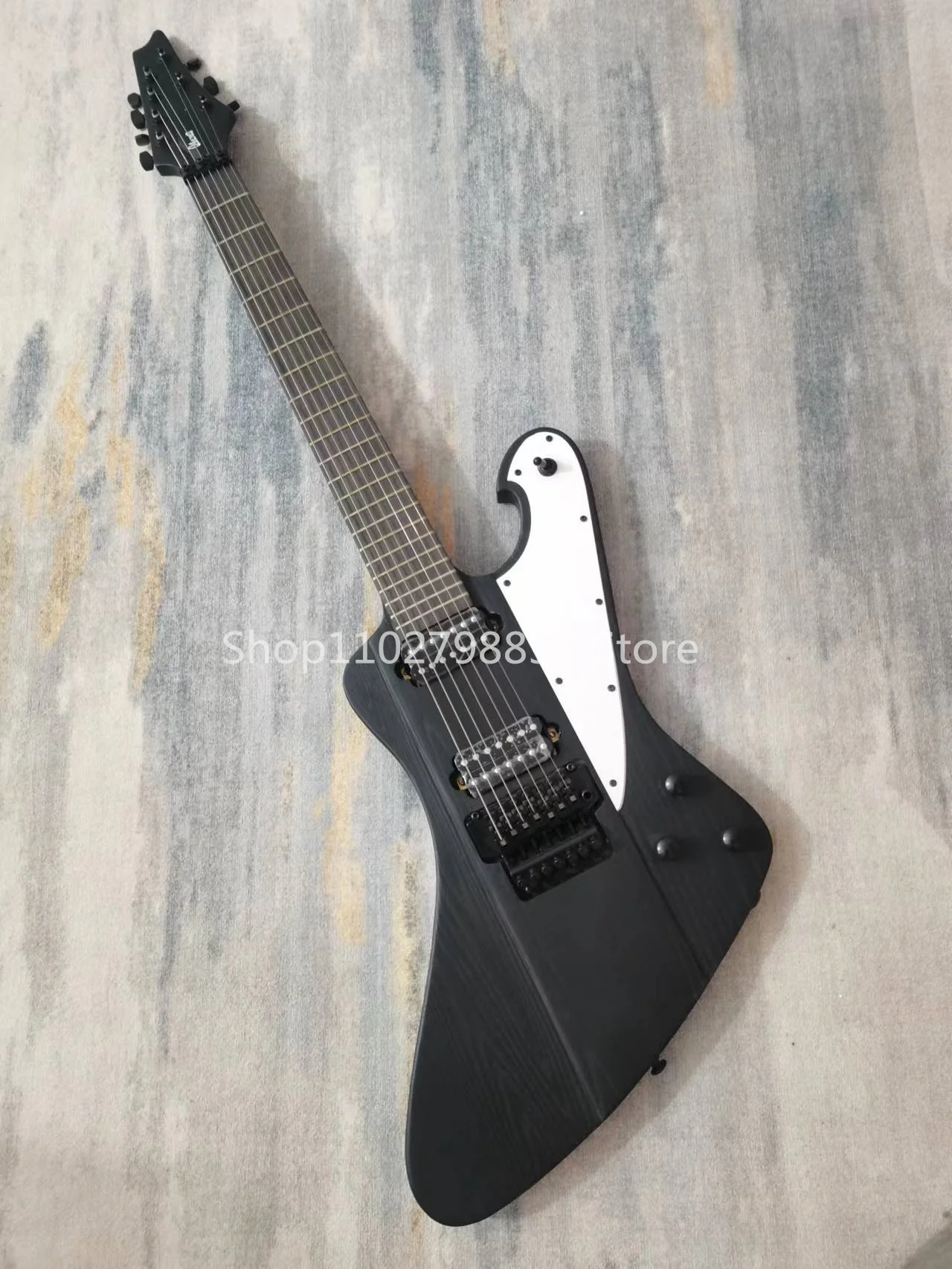 

7-string electric guitar, Rose Wood fingerboard, black accessories, vibrato system, free shipping
