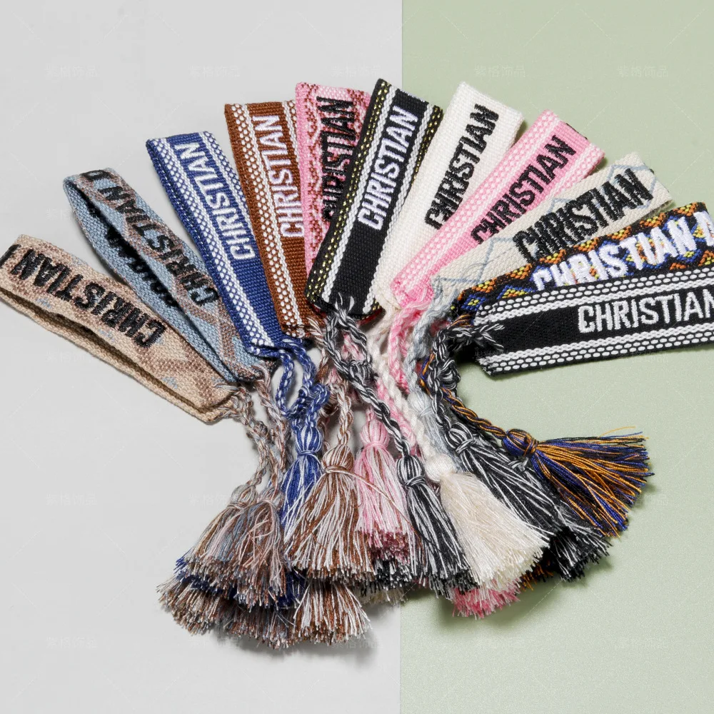 

Embroidered Wrist Band Tassel Letter Braided Bracelet Women Jewelry Wholesale Good Quality
