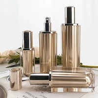 100ml120ml capacity gold color square shape acrylic material lotion bottle with alumite pump and alumite cap