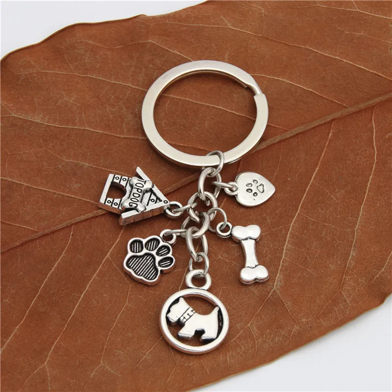 

Puppy Bone Pet Paw Print Pug Animal KeyChain KeyRing Women Man Accessories Jewelry Bag Pendant Friendship Family Gift