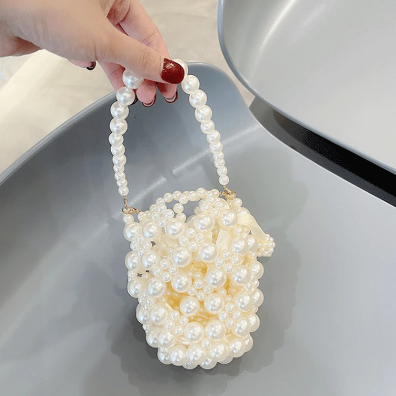 Popular Woven Bucket Holiday Portable Bead Bag Handmade Pearl Bag Female Pearl Chain Handbags for Women 2022Designer Luxury