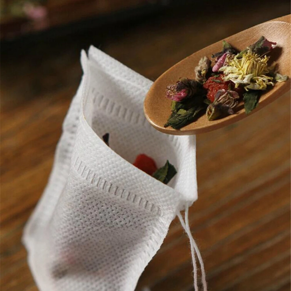 

Hot Sale 100 Pieces Non Woven Empty Tea Bag String Heat Seal Filter Paper Vanilla Tea Bag Brand New High Quality