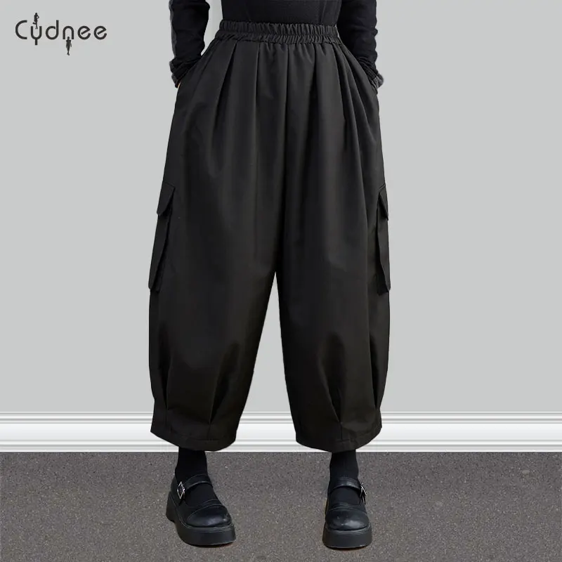 Женские широкие длинные брюки с высокой эластичной резинкой на талии и карманами