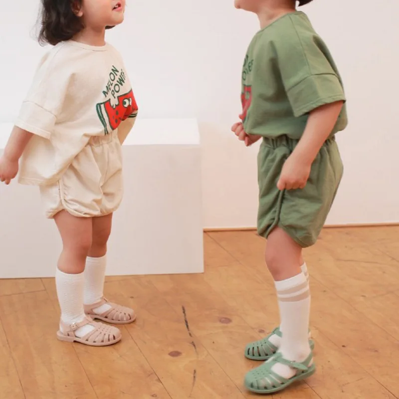 

Children's Summer Suits Korean Fan Sports and Leisure Cartoon Printing T-shirt Boys and Girls Short-sleeved Shorts Suit