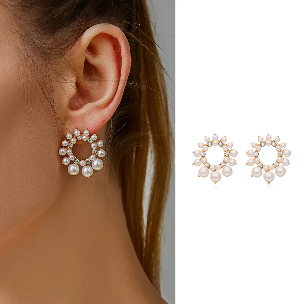 

French pearl stud earrings European and American personality design sense simple temperament pearl diamond circle earrings