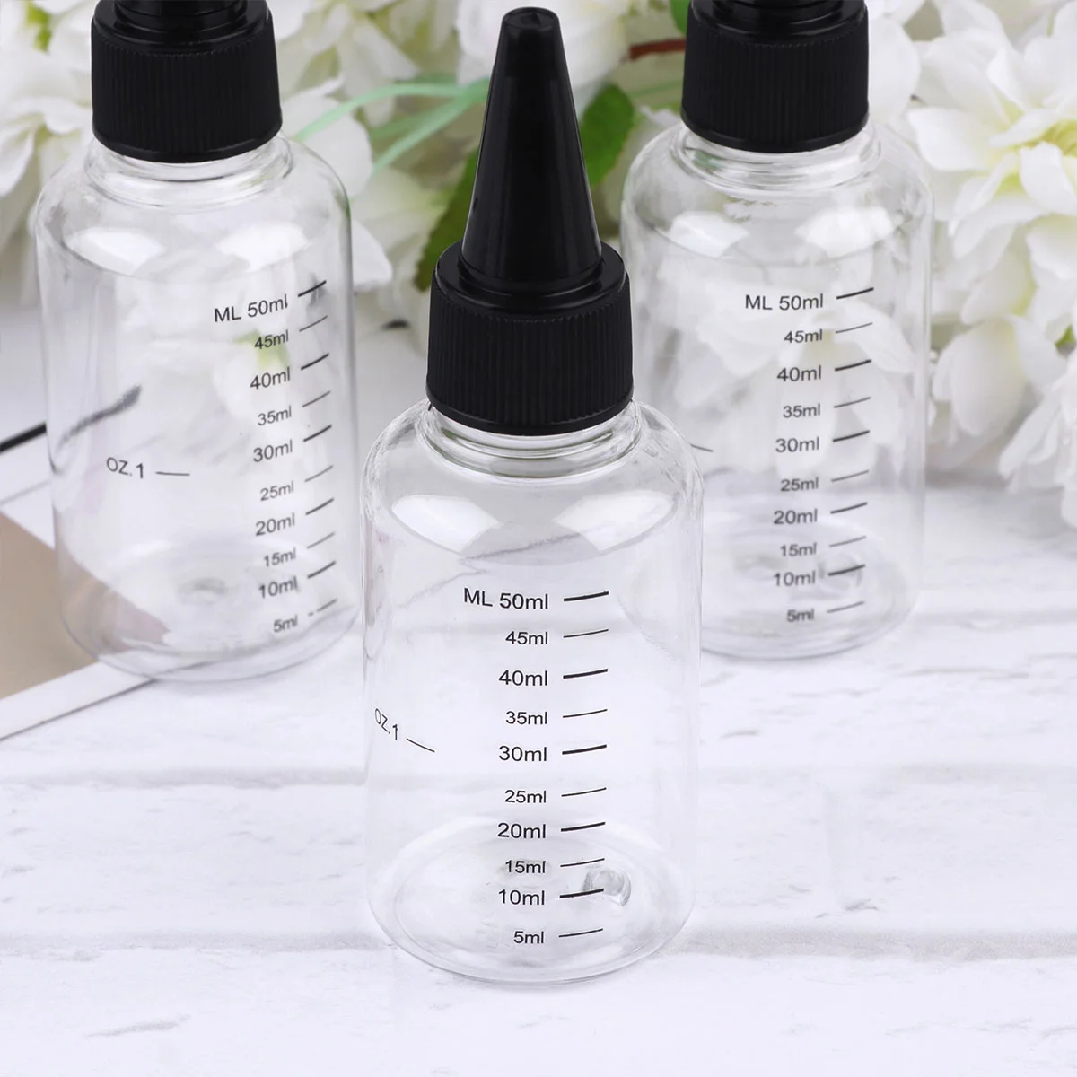 

1 Package of 50ML Transparent Portable Travel Empty Bottles Squeezable Tip Dropper Bottles with Scale (10Pcs/Package, Random