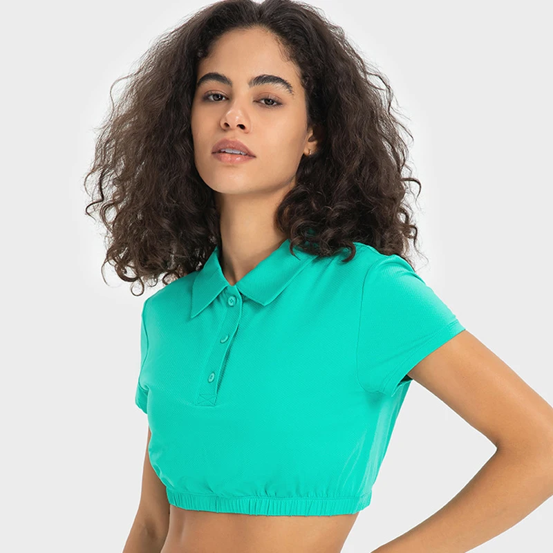 

A Logo Cropped Prestige Fitted Silhouette Polo Button-up With Cool Collar Yoga Short Sleeve Shirts Hits Just Below Bust Top
