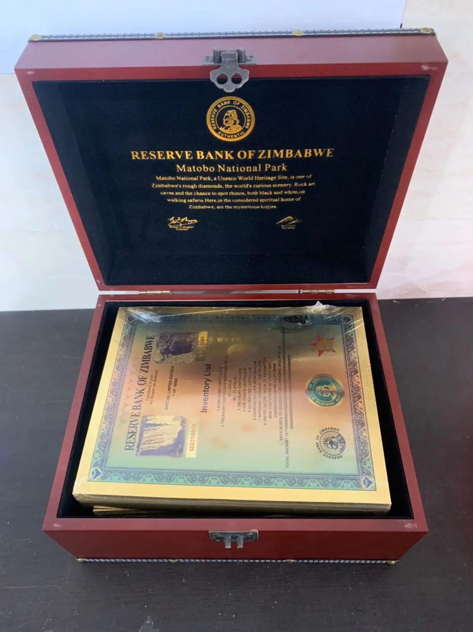 Контейнеры для банкнот из золотой фольги в Зимбабве Googolplex с коробкой УФ серийным