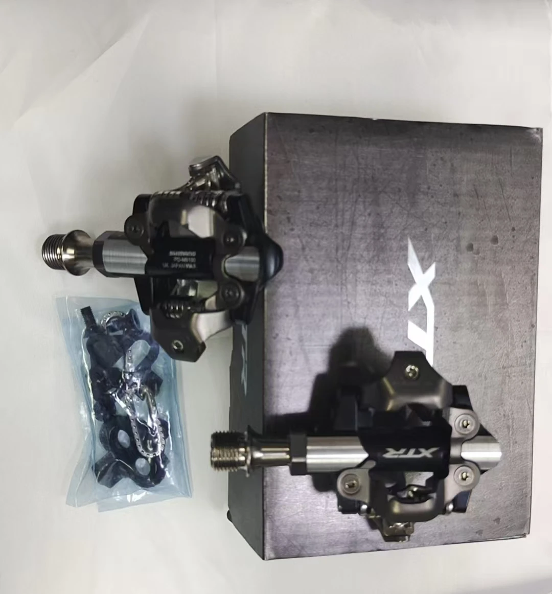 Фото Комплект педалей Shimano XTR PD-M9100 SPD с короткой осью и самоблокировкой для горного велосипеда, с шипами SM-SH51 №1