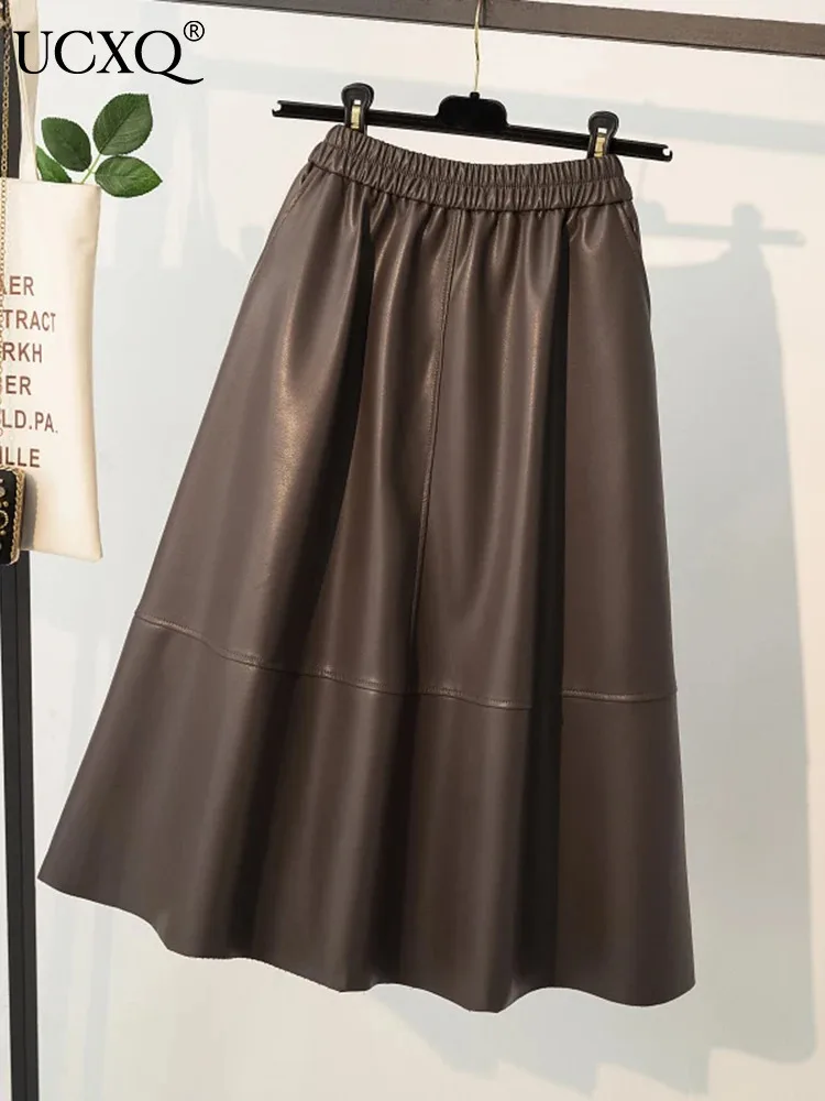 

UCXQ Oversized PU Leather Skirt Women High Waist Elastic Brown Versatile A-line Skirts 2023 Autumn Winter New Clothes 23A5239