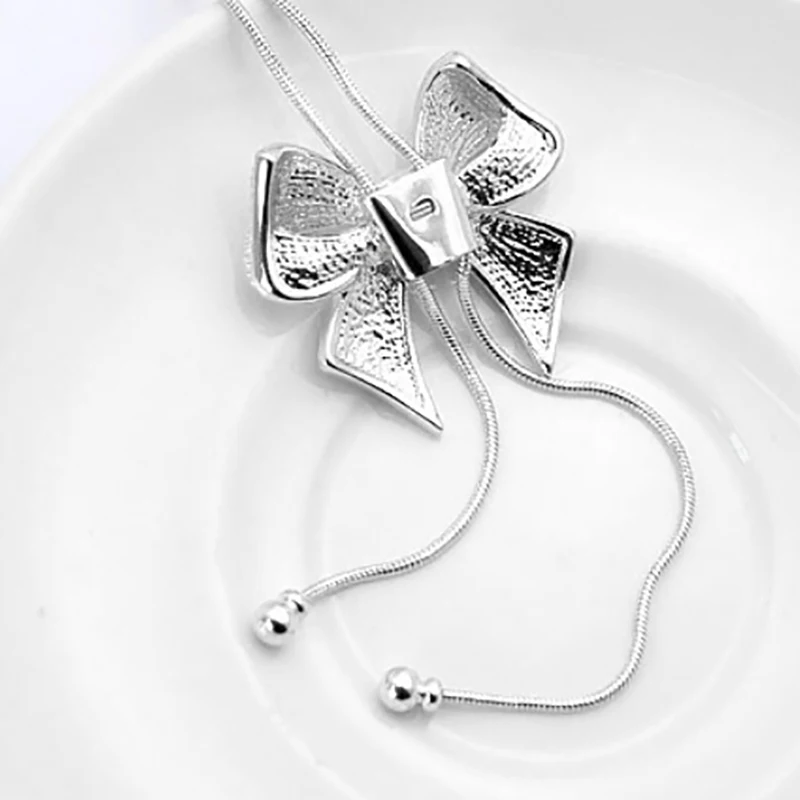

New Arrivals 2022 Trendy Fashion Exquisite Bow Knot Pendant Necklace Tassel Bow Tie Dinner Necklace Accessories