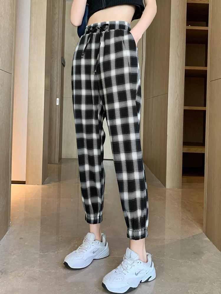Emily B Spotted in Fashion Nova Black and White Plaid Pant Set