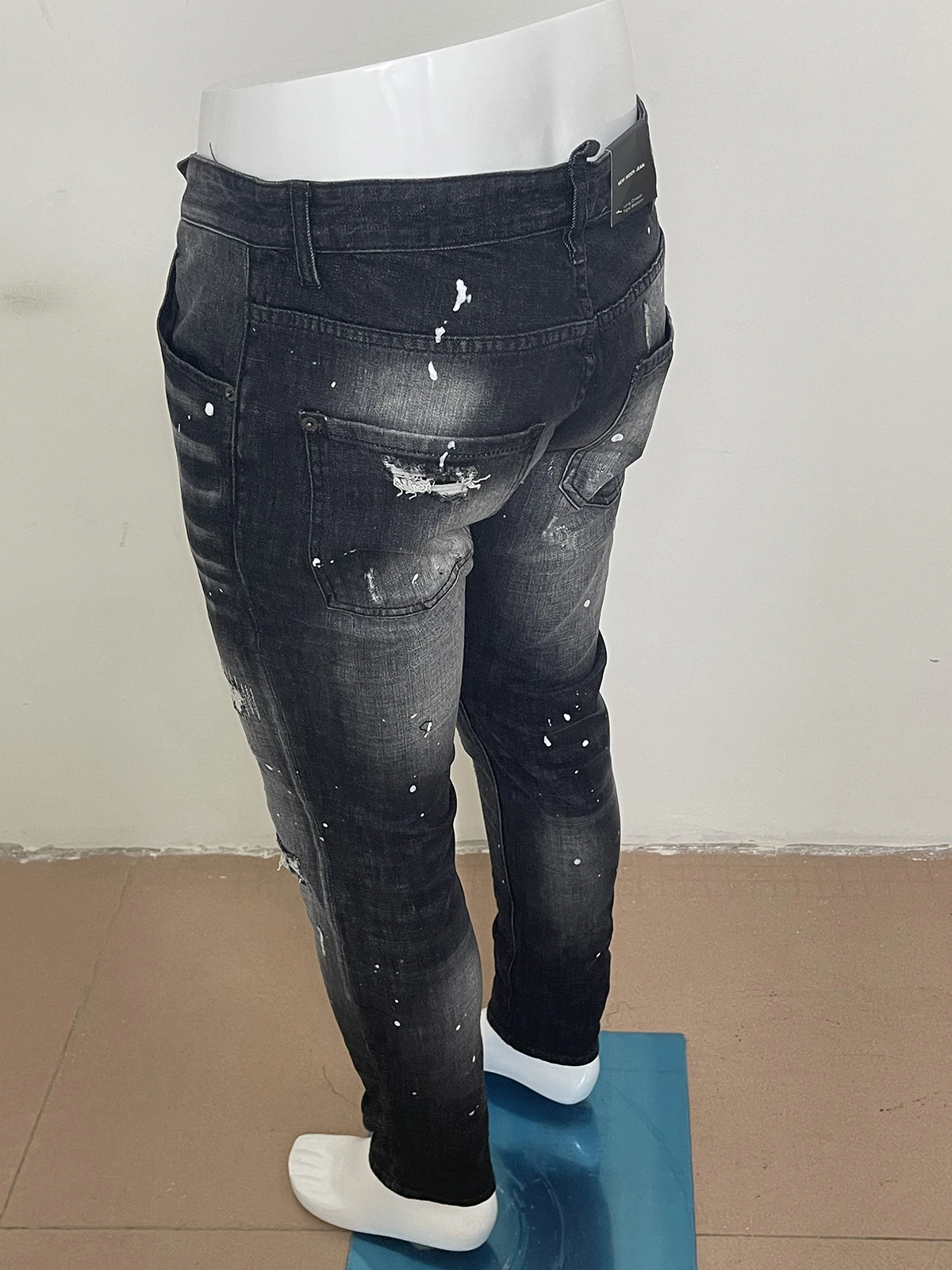 Spring/Summer 2023 new fashion men wash worn holes patch paint splashed ink small feet D2 jeans black jeans man