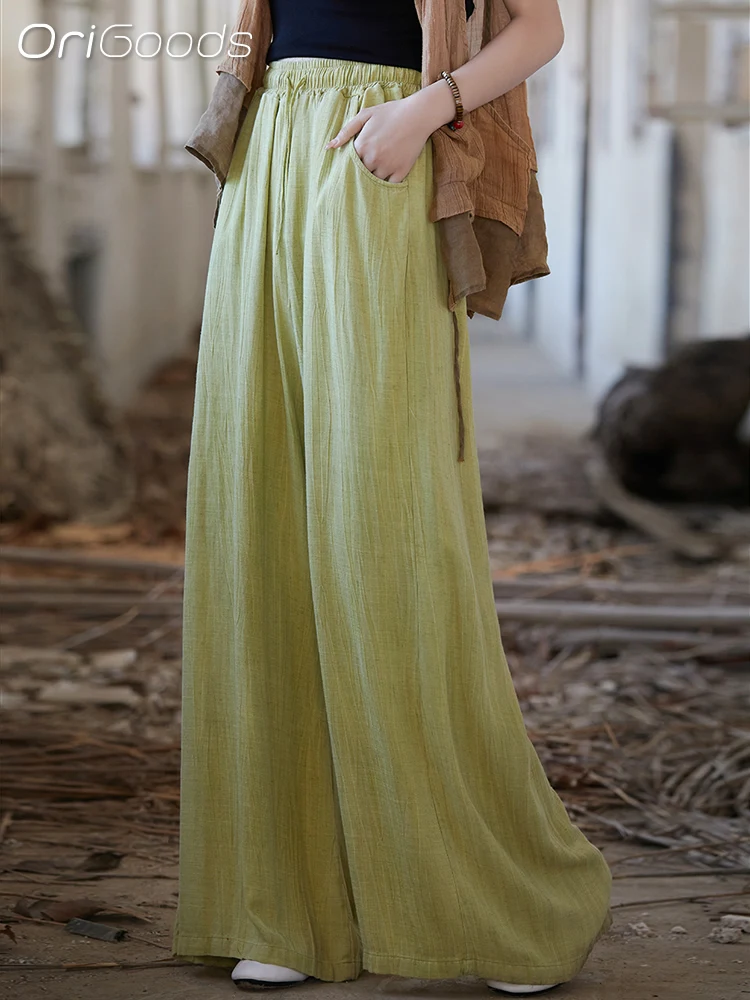 Женские широкие брюки из гладкой тонкой ткани с поясом на резинке