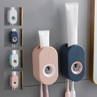 bathroom wall mounted toothpaste holder adhesive automatic toothpaste squeezer set toothbrush rack wall suctiontoothpaste squeez