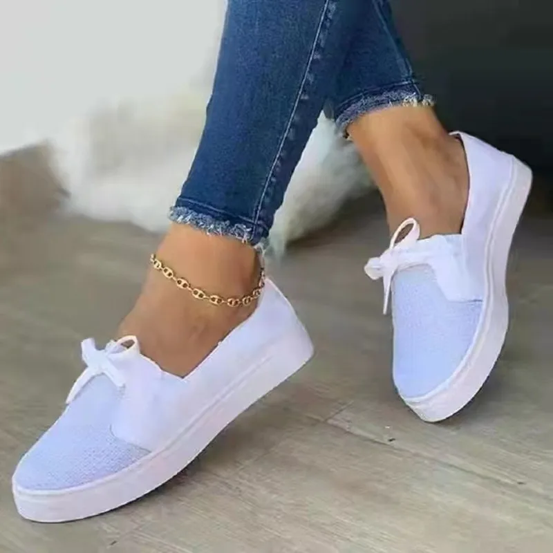 Autumn new spot large size women's shoes round head bow round head canvas flat heel shallow mouth single shoes wish