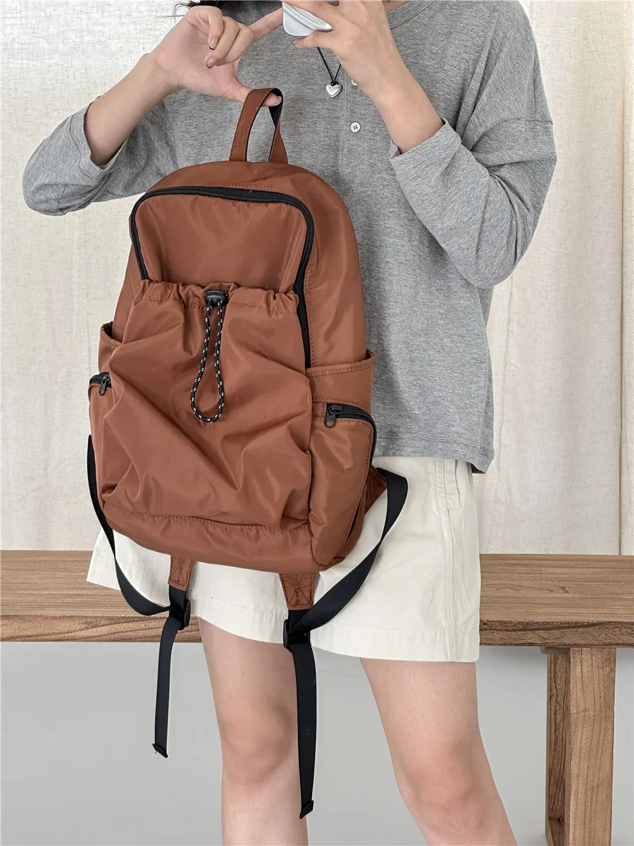 

College students class backpack girls Korean version large-capacity shoulder bag pleated nylon laptop commuter backpack female