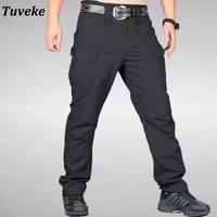 tuveke new casual mens tactical pants multi pocket stretch military commuter tactical pants mens slim fit cargo pants s 6xl