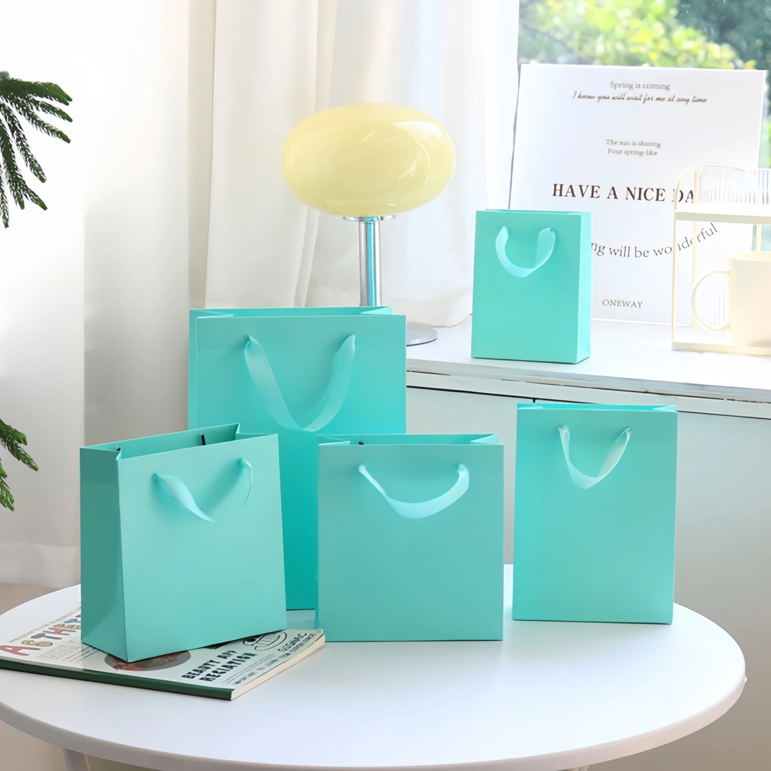 

Картонные белые пакеты Manshii с логотипом