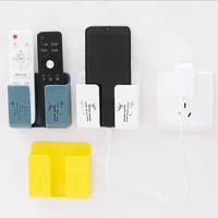 new mobile phone charging holder wall mounted organizer remote controller organizer plastic cellphone hanging bracket