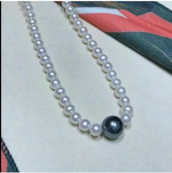 

Refinement AAA 9-11mm Round Natural White Black South Sea Pearl Necklace 18"