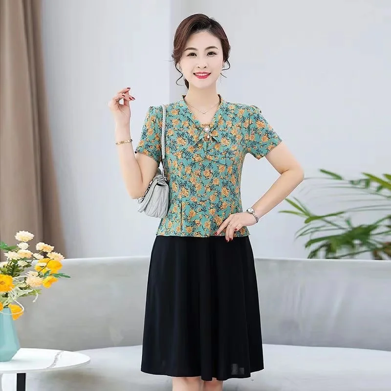 

XJ6 Mom's Summer Dress 2023 New Fashionable Middle aged Women's Spring/Summer Thin Fashion 3/4 Sleeve Fragmented Flower Skirt
