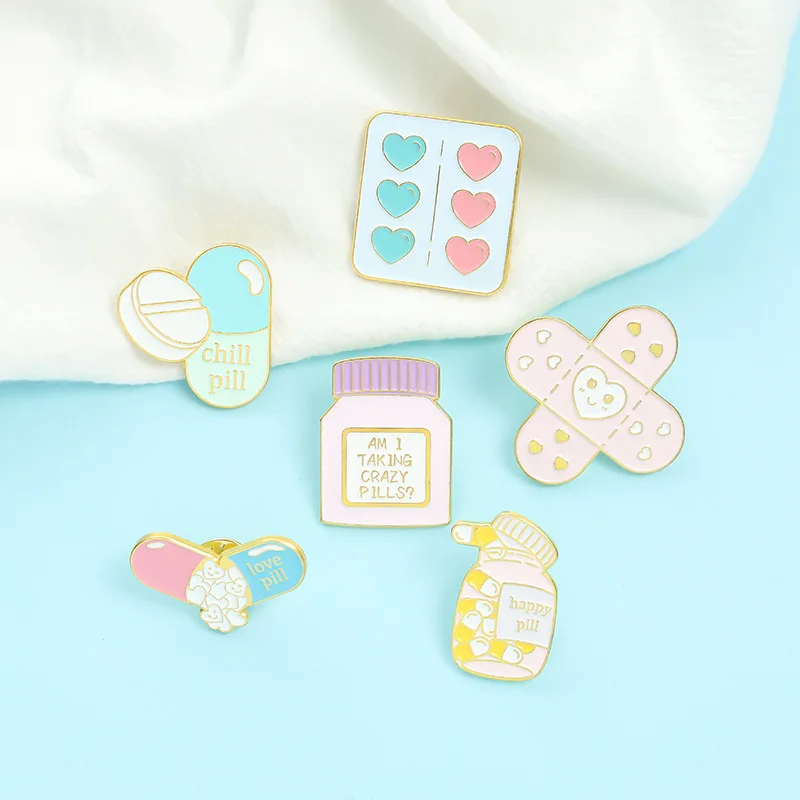

Cartoon Cute Mini Band Aid Capsule Shape Letter Brooch Paint Badge Brooch Oil Drop Badge Wholesale