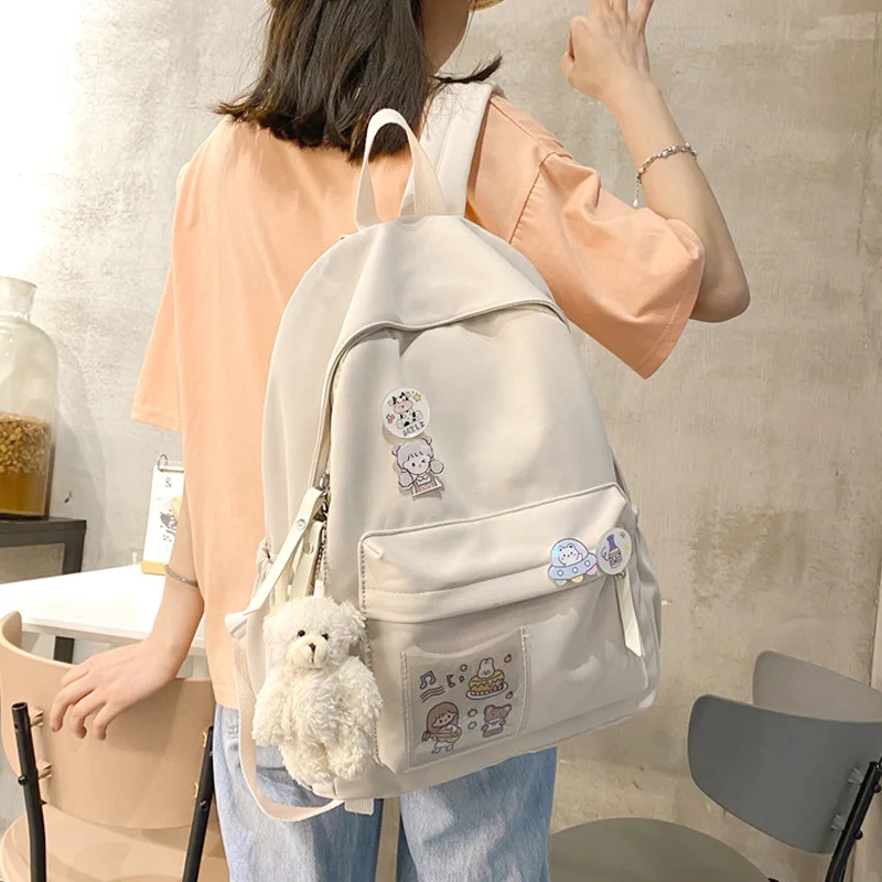 

Lovely Female Backpacks Simple Design Girls School Bag Junior High Students Laptop Rucksack Women With Bear Pendant Mochilas